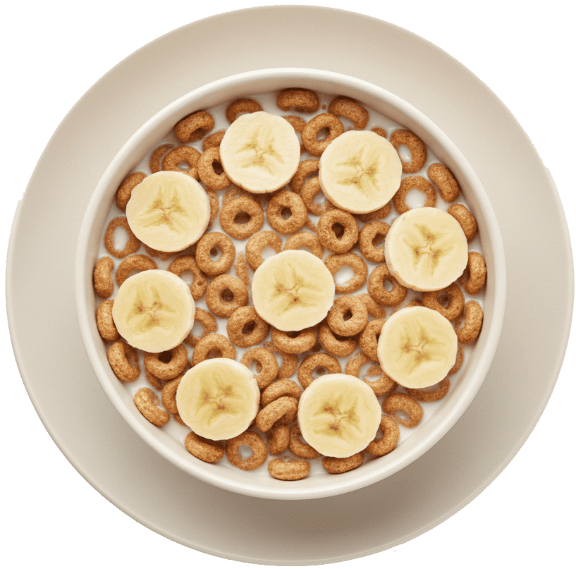 Cereal with milk and banana slices